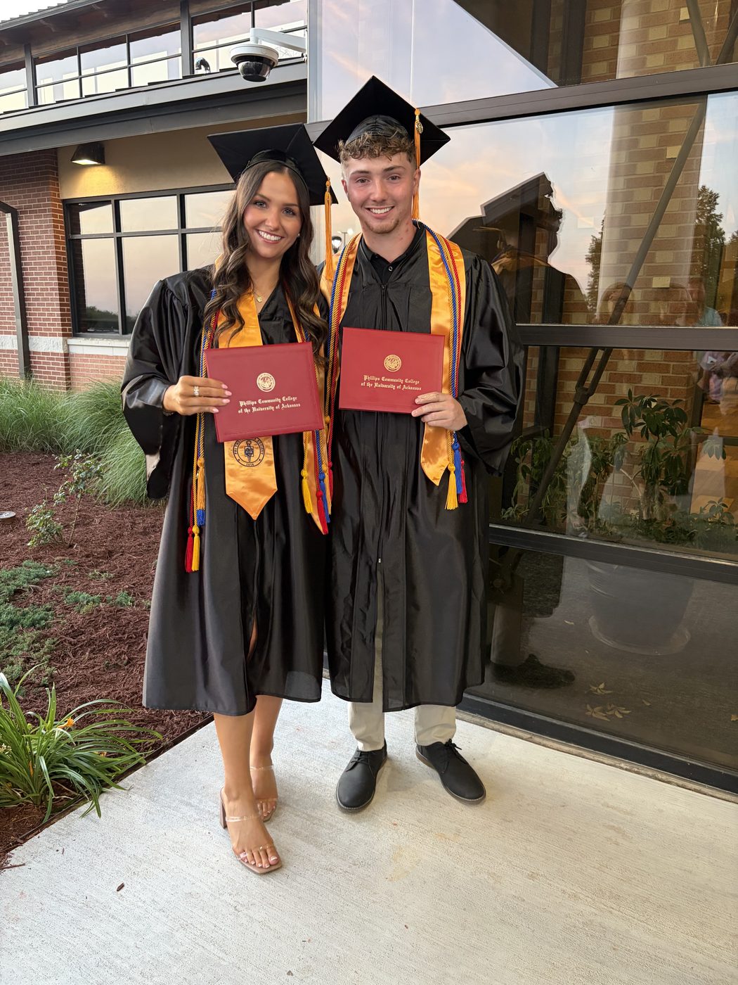 Nick Brown and Allison at their Phillips Community College graduation